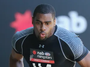 Eric Winston runs at the AFL Combine on October 23, 2012