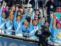 Manchester City's Bernardo Silva and John Stones lift the FA Cup on May 16, 2026