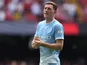 Elliot Anderson of Manchester City applauds the fans