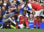 Danny Welbeck sits injured during the Premier League game between Chelsea and Arsenal on September 17, 2017