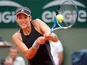 Spain's Garbine Muguruza in action during her quarter-final match against Russia's Maria Sharapova on June 6, 2018