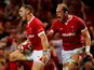 Wales' George North celebrates scoring their first try on August 17, 2019