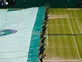 Play abandoned on outside courts at Wimbledon