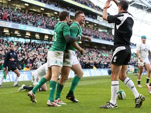 Robbie Henshaw of Ireland is congratulated by teammate Jared Payne of Ireland after scoring the opening try during the RBS Six Nations match on March 1, 2015