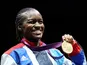 Nicola Adams celebrates winning gold at the London 2012 Olympics