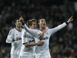 Ronaldo treble downs Sevilla