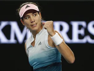 Konta goes down fighting as Muguruza seals victory at 3.12am