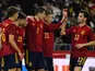 Spain's Alvaro Morata celebrates scoring a goal with teammates on March 29, 2022