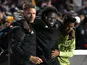 Los Angeles FC forward Yekeson Subah (center) is helped to the locker room after a message board fell on his legs on May 9, 2023
