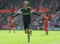 Stoke City's Peter Crouch celebrates scoring against Southampton on May 19, 2013