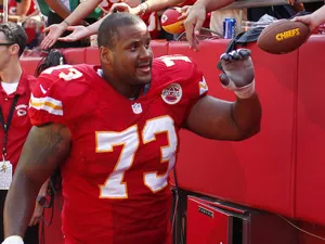 Jon Asamoah of the Kansas City Chiefs greets fans after the victory over the Dallas Cowboys September 15, 2013