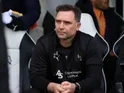 John Eustace sits on the bench pre Leeds United FA Cup