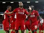 Daniel Sturridge celebrates scoring the opener during the Champions League group game between Liverpool and Paris Saint-Germain on September 18, 2018