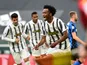 Juventus' Juan Cuadrado celebrates scoring their third goal against Inter Milan in Serie A on May 15, 2021