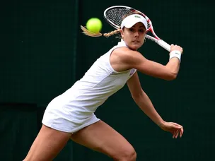 Cornet stuns Halep