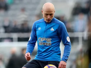 Bella, 7, led out by hero Mooy at Huddersfield