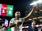 Riyad Mahrez of Algeria waves to the crowd