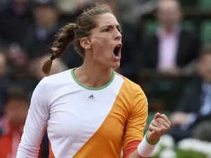 Petkovic through to French semis