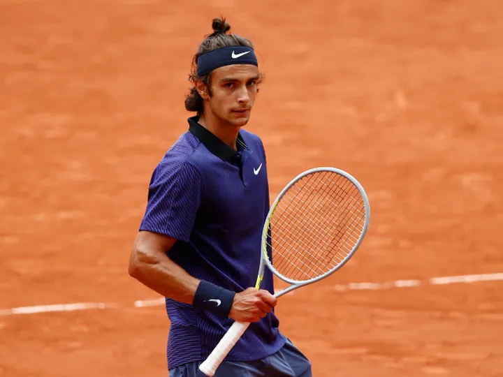 French Open roundup: Djokovic survives scare, Nadal eases to victory
