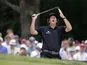 Phil Mickelson reacts to his shot from the bunker on the second hole during the fourth round of the U.S. Open golf tournament on June 16, 2013