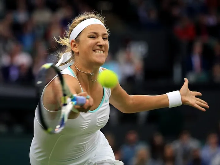 Azarenka through, defending champion out