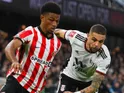 Sunderland's Amad Diallo in action with Fulham's Layvin Kurzawa on January 28, 2023
