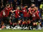 Bournemouth's Dan Gosling celebrates scoring their first goal with teammates on December 14, 2019
