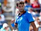 Dimitrov cruises into third round
