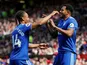 Cardiff City's Nathaniel Mendez-Laing celebrates scoring their first goal from the penalty spot with Bobby Reid on May 12, 2019