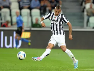 Vidal, Tevez give Juve control