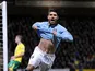 Sergio Aguero celebrates after scoring his team's third goal on December 29, 2012