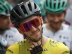 Adam Yates edges out twin brother to win stage one of Tour de France