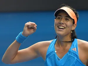 Garbine Muguruza celebrates victory over Caroline Wozniacki during their Australian Open third round match on January 18, 2014