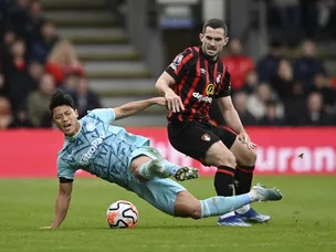 Wolves beat 10-man Bournemouth at Vitality Stadium