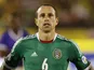 Mexico's Gerardo Torrado listens the national anthem before the start of the 2014 World Cup qualifying soccer match against Jamaica on June 4, 2013