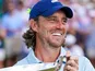 Tommy Fleetwood wins the Tour Championship in August 2025.