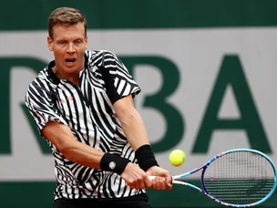 Berdych digs deep to overcome Jaziri