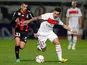 Paris Saint Germain's Ezequiel Lavezzi and Nice's Valentin Eysseric battle for the ball on December 1, 2012