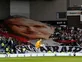 Legia Warsaw fans unfurl Pope John Paul II banner at Ibrox