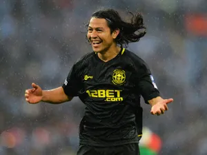 Roger Espinoza of Wigan Athletic celebrates victory after the FA Cup with Budweiser Final between Manchester City and Wigan Athletic at Wembley Stadium on May 11, 2013