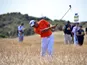 England's Lee Westwood chips out of the rough during day three of the 2013 Open Championship on July 20, 2013