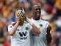 Wolverhampton Wanderers Raul Jimenez celebrates with a mask during the FA Cup semi-final against Watford on April 7, 2019