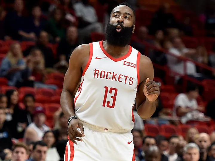 Heat bring Rockets' hot streak to end with narrow victory