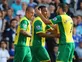 Norwich City clear debts