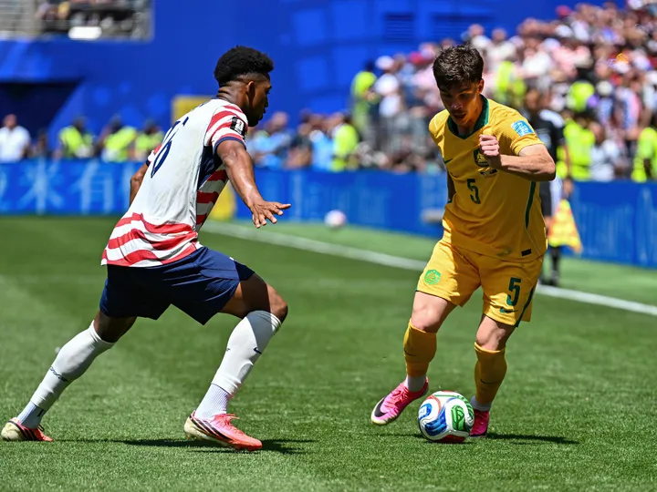 Jordan Bos outstanding as Australia secure knockout-stage qualification