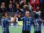 Sirius FK’s Robbie Ure celebrates with his teammates after scoring
