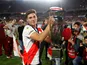 River Plate's Julian Alvarez celebrates winning the Argentina Primera Division with the trophy on November 25, 2021