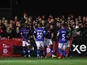 Ipswich Town's Freddie Ladapo celebrates scoring their second goal with teammates on November 7, 2022