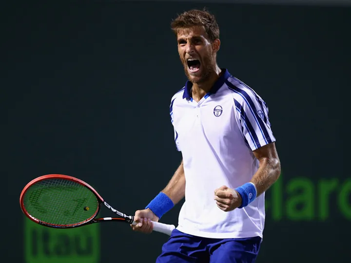 Klizan overcomes Robredo to reach semis