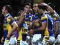 Leeds Rhinos' Joel Moon is congratulated by teammates after a try against Salford City Reds on February 15, 2013